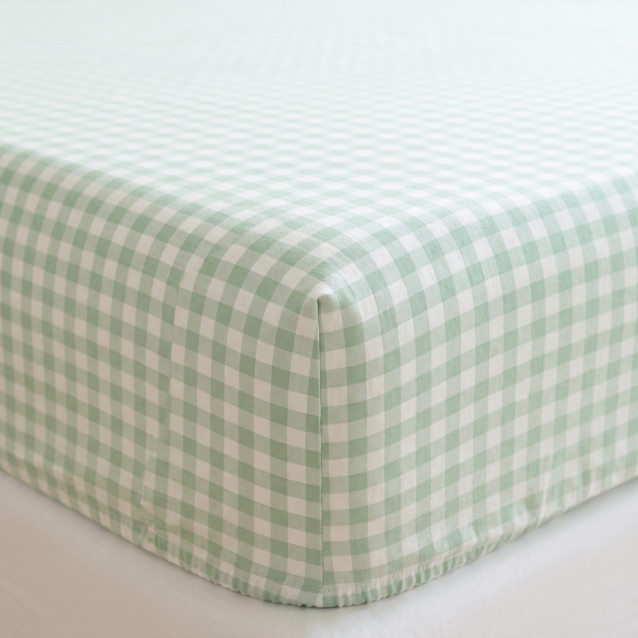 Gingham Fitted Sheet in Green Gingham – close-up of a fitted corner on a mattress