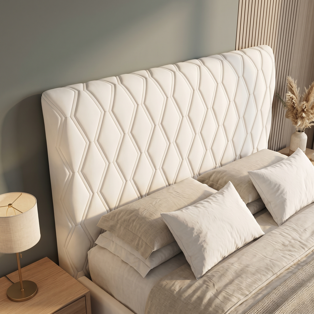Quilted Headboard Cover – Padded in White – high angle view beside slatted wall panel and pampas grass