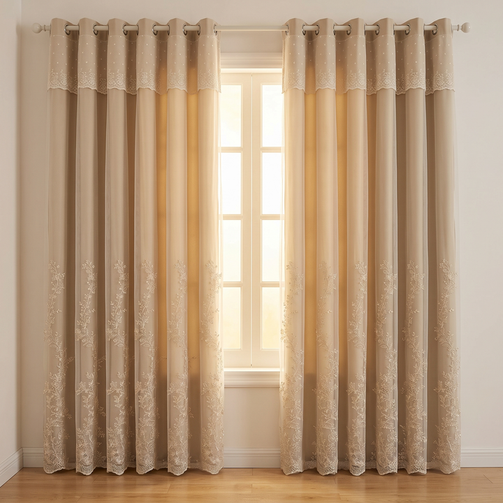 Layered Curtain Panel – Embroidered Sheer in Beige – hung on a grommet rod beside a sunlit window