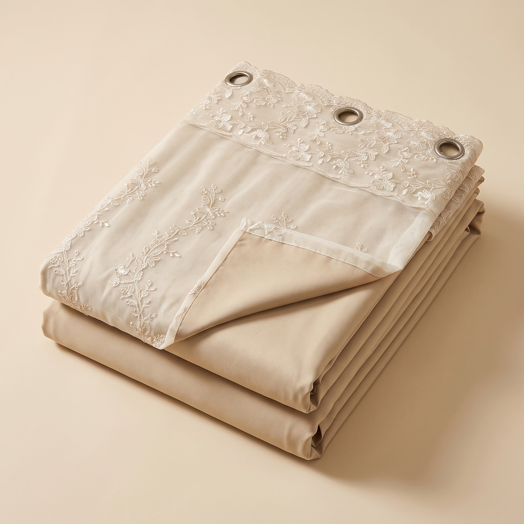Layered Curtain Panel – Embroidered Sheer in Beige – folded and stacked on a plain background, lining corner turned back