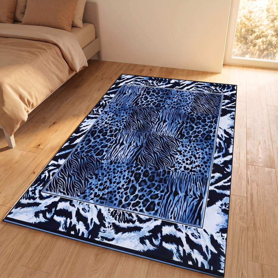 Leopard Print Rug – Washable in Blue – on a wood floor beside a bed in a sunlit bedroom
