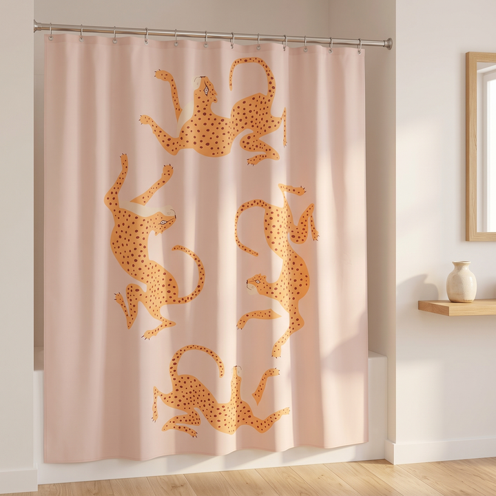 Boho Leopard Print Shower Curtain in Blush Pink – Cheetah – closed beside wood-framed mirror and ceramic vase on shelf