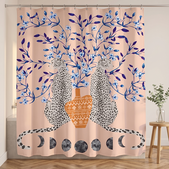 Boho Leopard Print Shower Curtain in Peach – Moon Phase Leopards – closed with eucalyptus stems in glass vase, herringbone wood floor