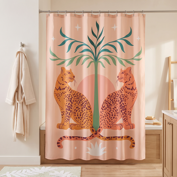 Boho Leopard Print Shower Curtain in Peach – Twin Leopards – closed beside a waffle-weave robe hanging on a wall hook