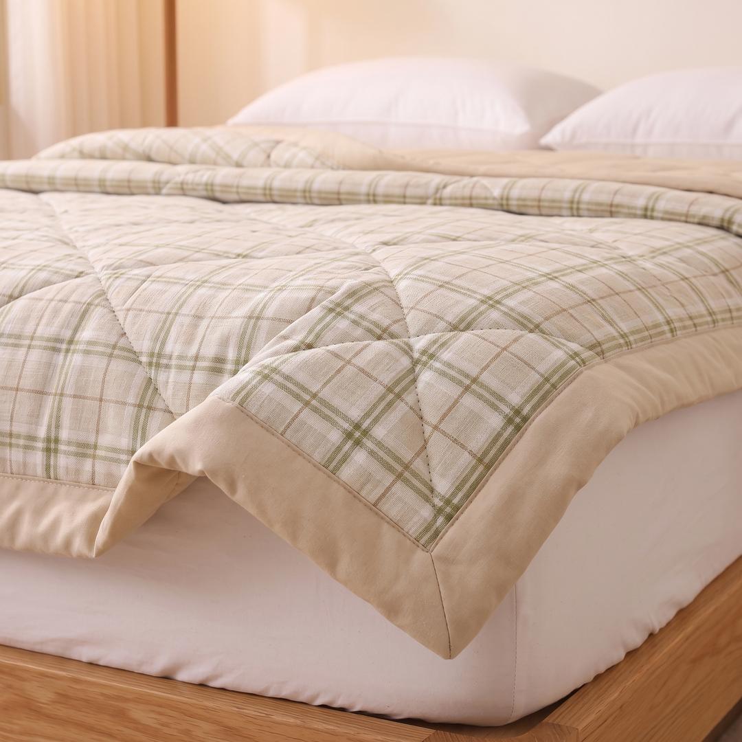 Lightweight Quilted Coverlet in Olive Plaid – low side angle showing plaid check and wide border