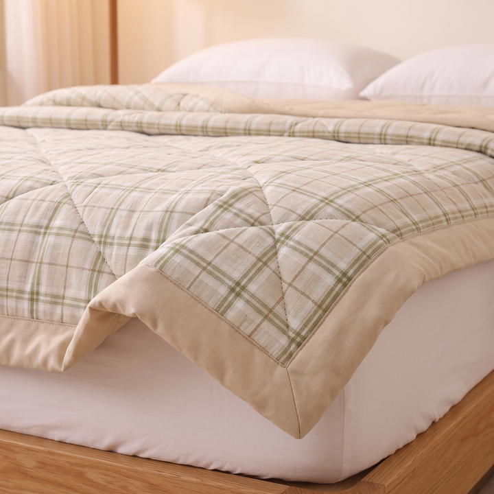 Lightweight Quilted Coverlet in Olive Plaid – low side angle showing plaid check and wide border
