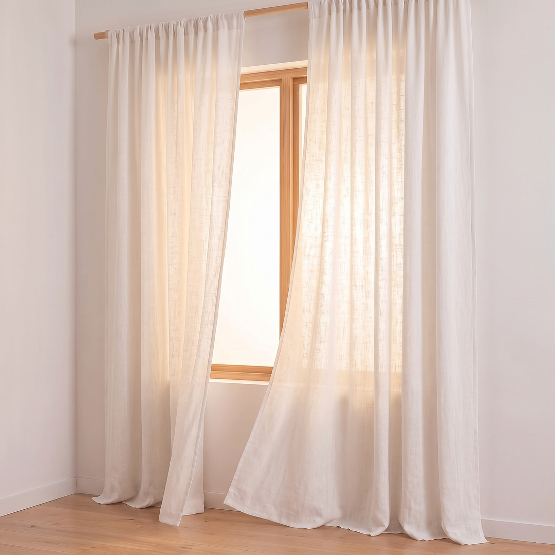 Linen Curtain Panel – Light Filtering, Rod Pocket in White – side angle of panels billowing gently with daylight behind