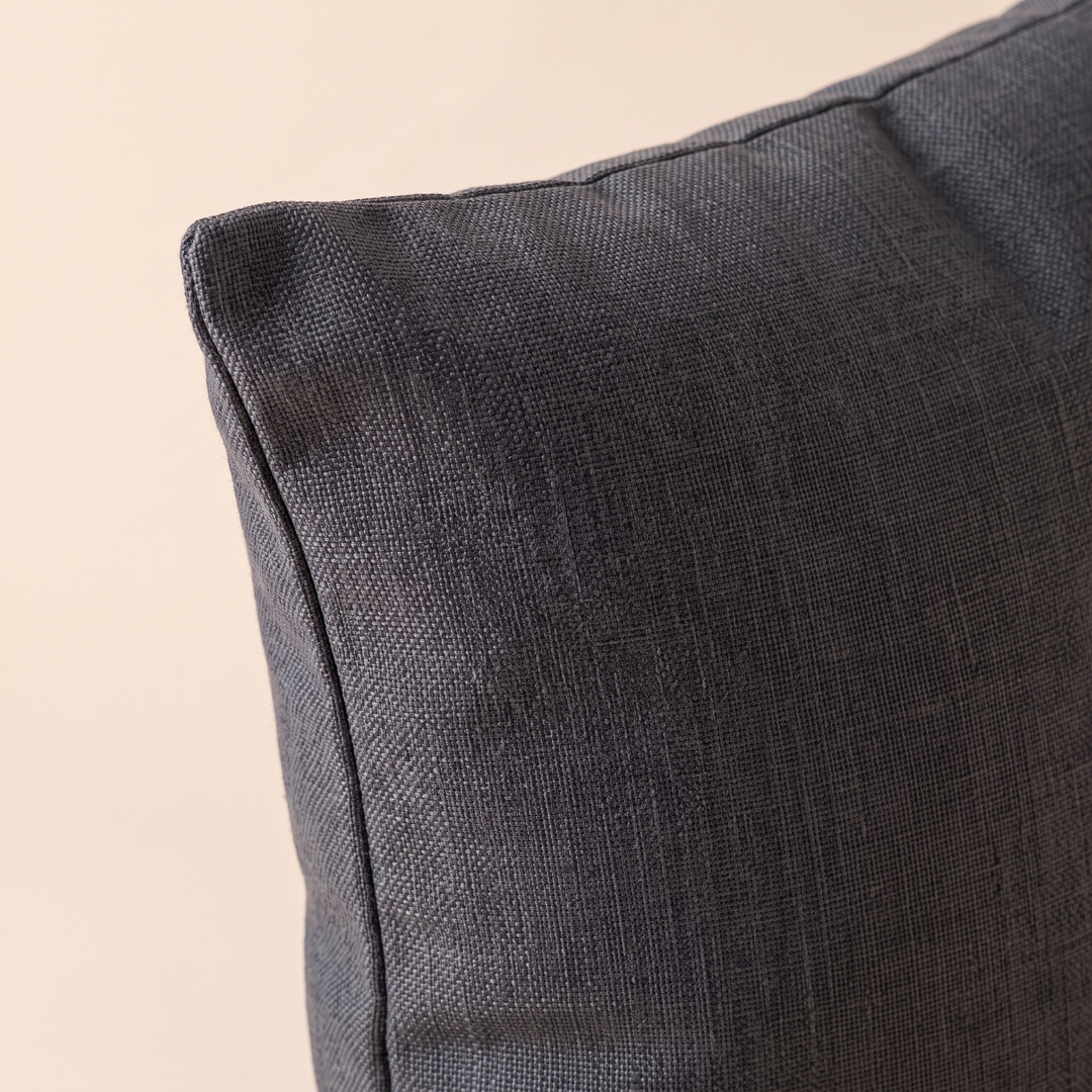 Linen-Look Pillow Cover in Dark Gray – macro detail of the coarse woven fabric texture