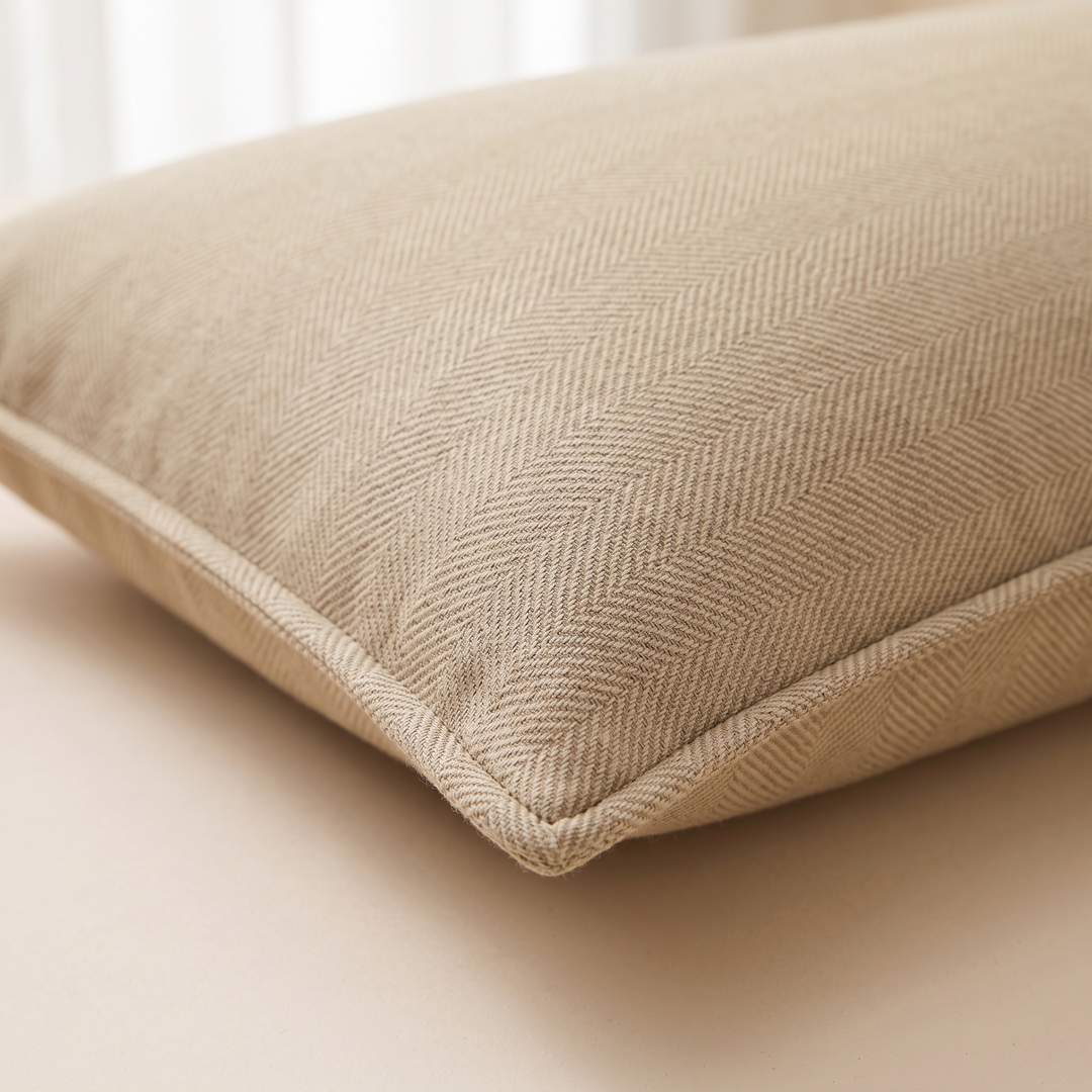 Long Lumbar Pillow Cover in Beige – close-up of herringbone weave and piped corner edge