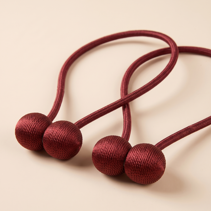 Magnetic Curtain Tiebacks – Set of 2 in Burgundy – angled close-up of ribbed thread texture on the balls
