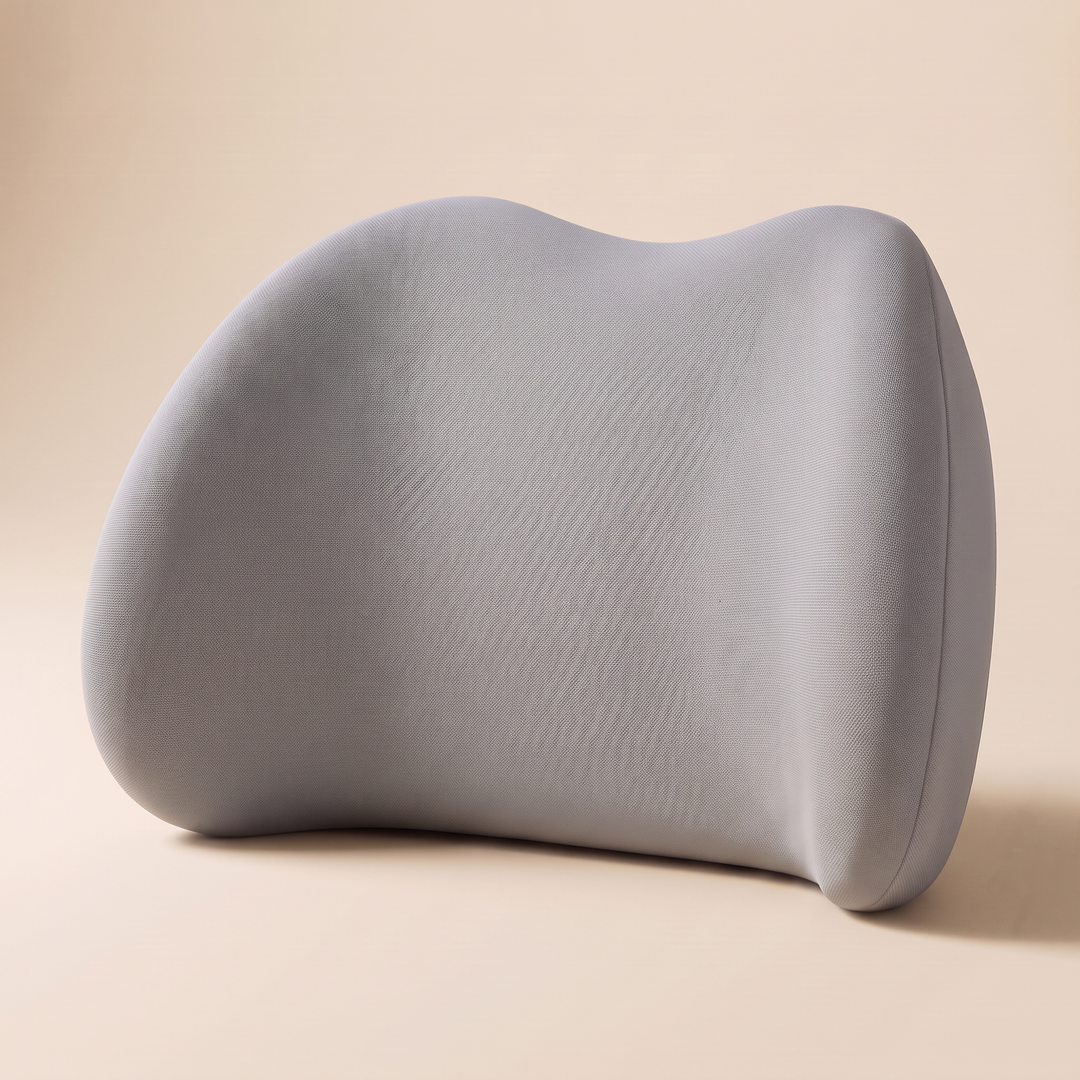 Memory Foam Lumbar Pillow in Gray – standing upright on a plain beige studio background, angled three-quarter view