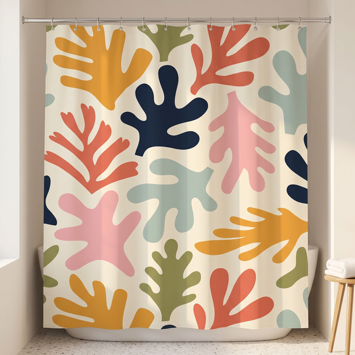 Mid-Century Modern Shower Curtain – Abstract Art in Cream Leaf Cut-Outs – hanging on a rod over a bathtub in a bathroom
