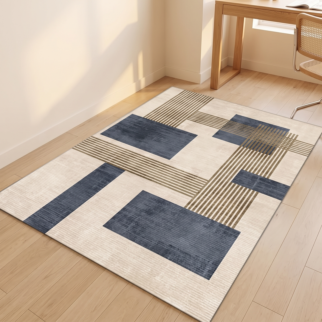 Modern Geometric Rug – Washable in Navy Blue – laid flat on a light wood floor near a desk
