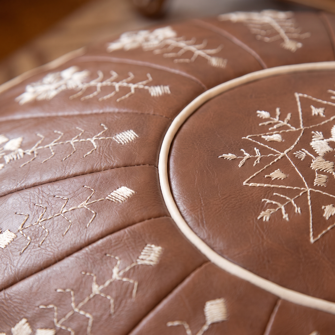 Moroccan Pouf Cover – Unstuffed in Brown – Embroidered – close-up of cream embroidery and piped top seam