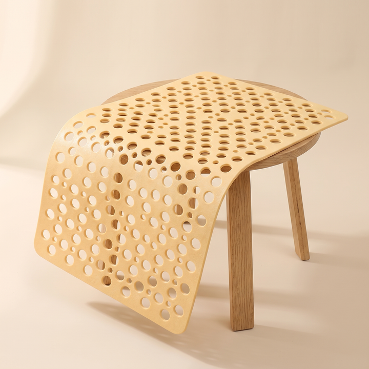 Non-Slip Shower Mat with Suction Cups in Light Yellow – draped over a round wooden stool with oak legs