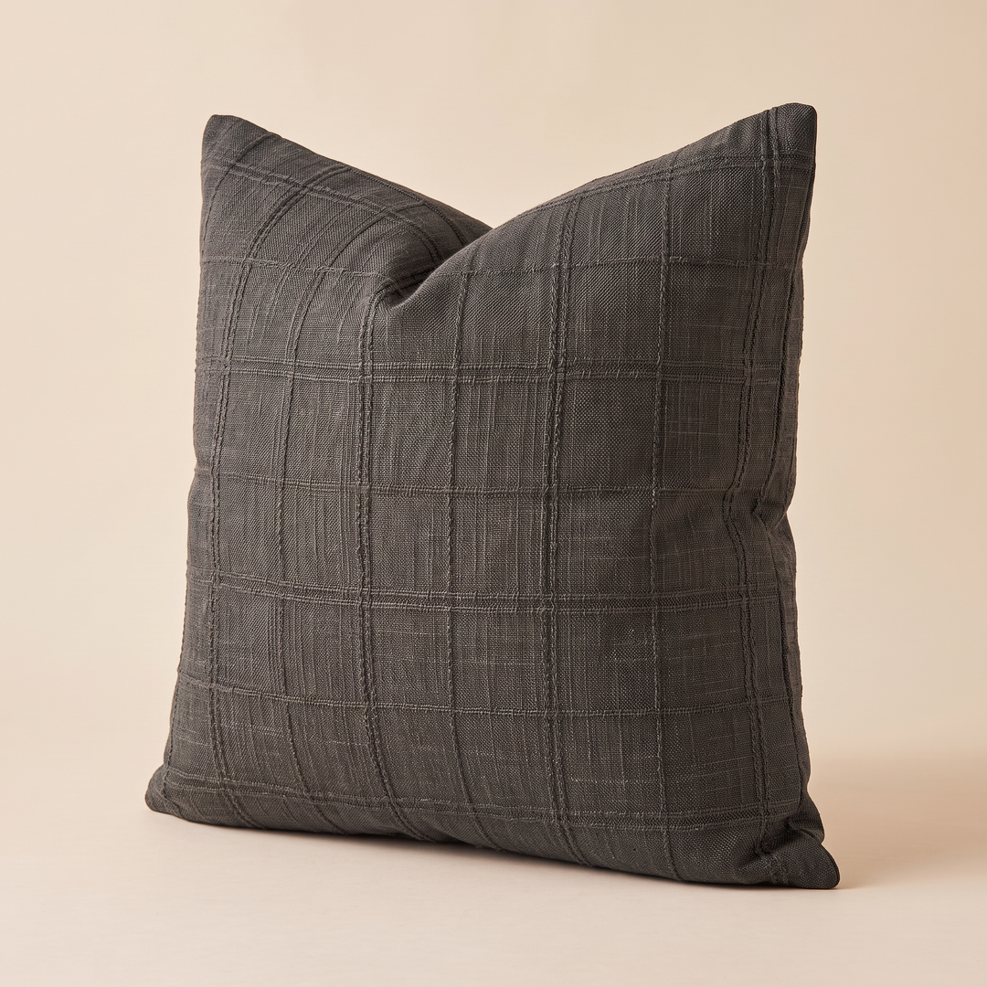 Plaid Pillow Cover – Textured Grid Check in Dark Gray – angled three-quarter view showing the corner and raised grid stitching