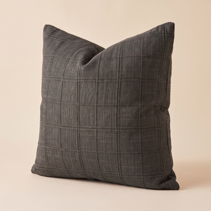 Plaid Pillow Cover – Textured Grid Check in Dark Gray – angled three-quarter view showing the corner and raised grid stitching