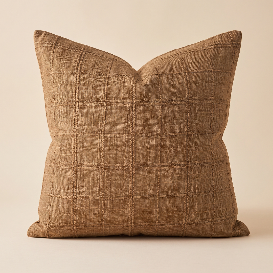 Plaid Pillow Cover – Textured Grid Check in Brown – front view standing upright against a plain cream backdrop