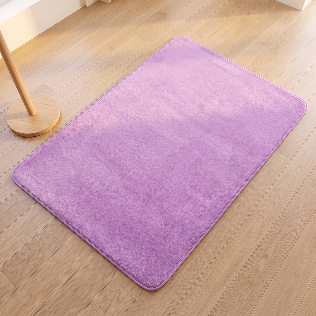 Plush Area Rug in Lilac – laid flat on a wood floor beside a wooden stand base