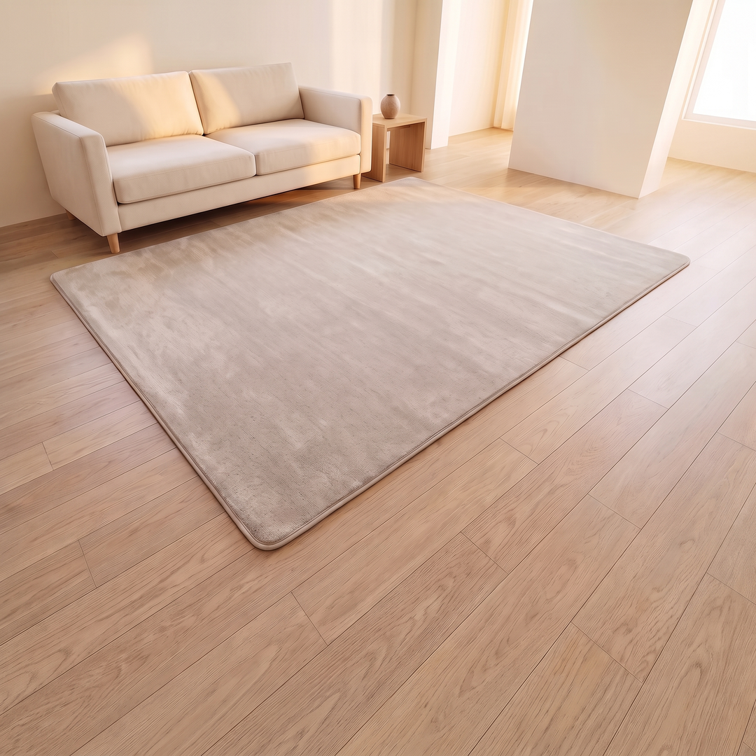 Plush Area Rug in Beige – laid flat on a wood floor in front of a sofa