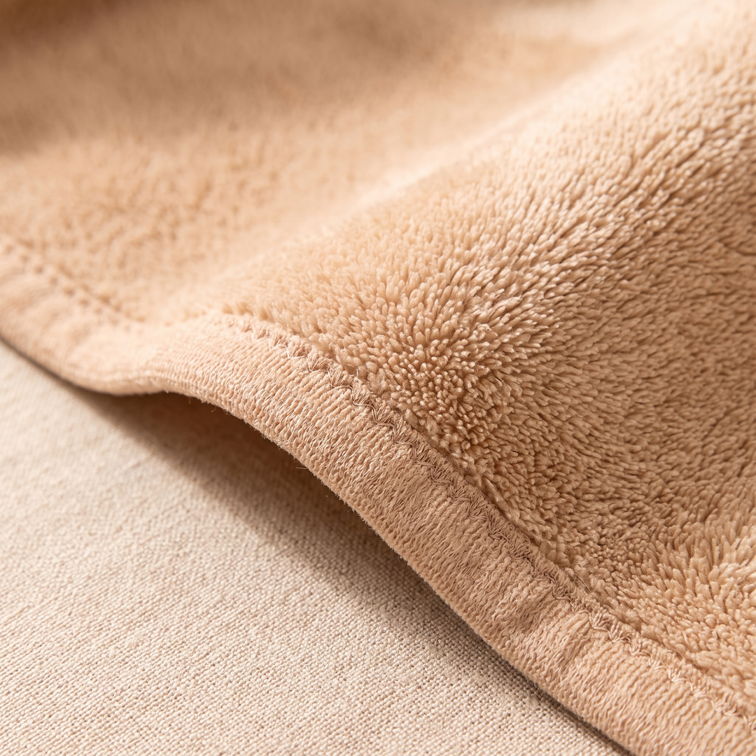 Plush Bath Towel Set – 2 Piece in Camel – close-up of the looped pile and stitched hem edge