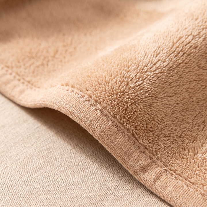 Plush Bath Towel Set – 2 Piece in Camel – close-up of the looped pile and stitched hem edge