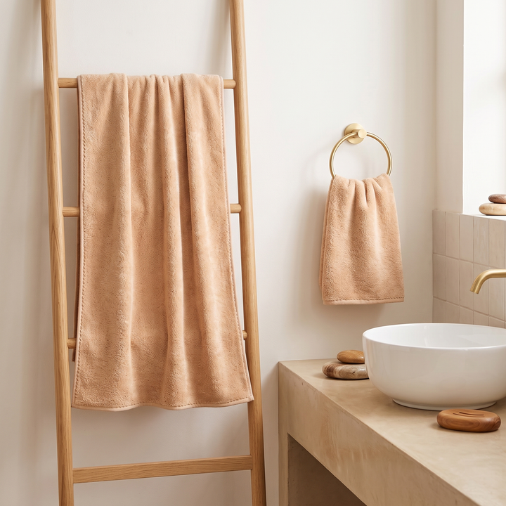 Plush Bath Towel Set – 2 Piece in Camel – hanging on a wooden ladder and ring holder in a bathroom