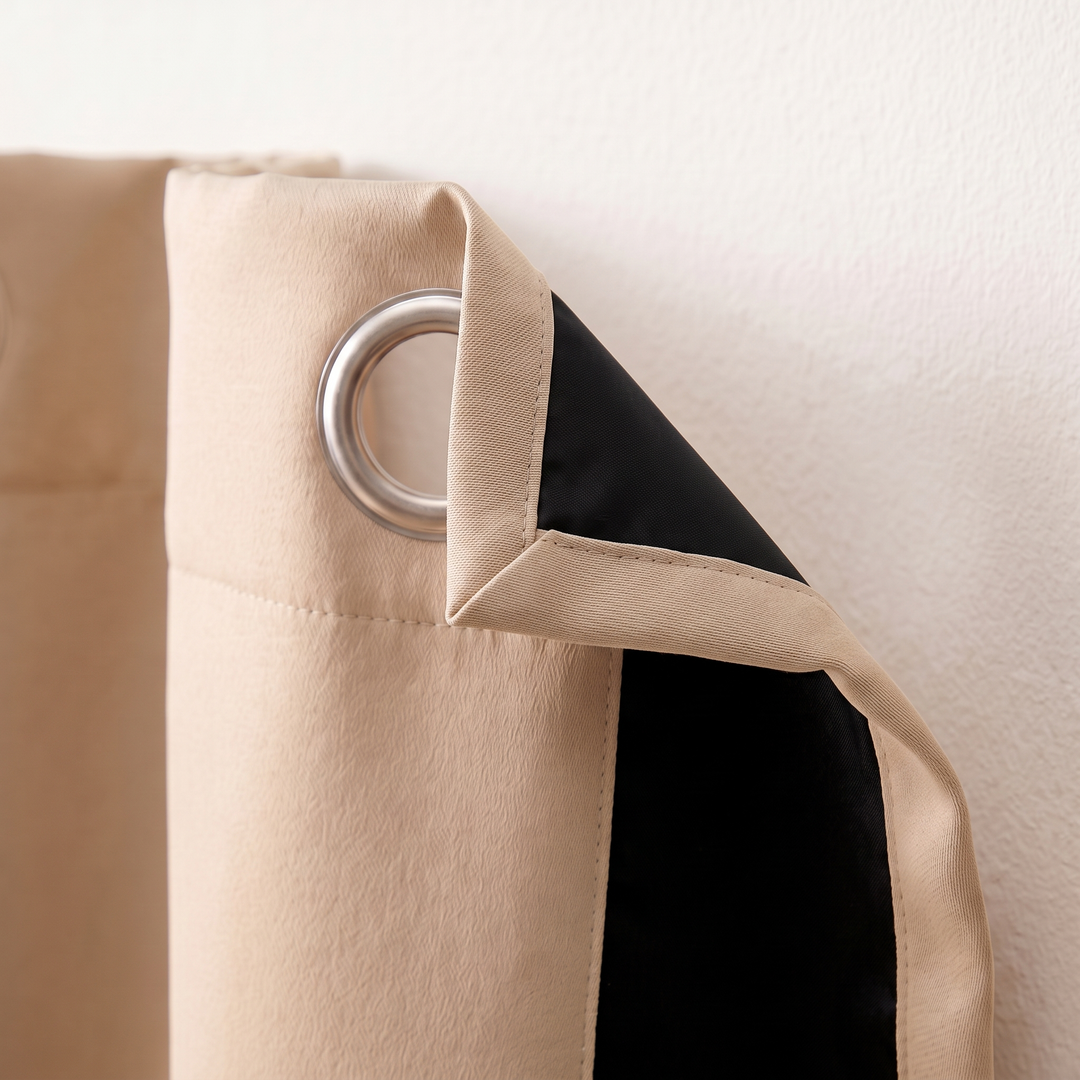 Room Darkening Curtain Panel – Grommet Top in Beige – close-up of grommet and folded corner showing black backing