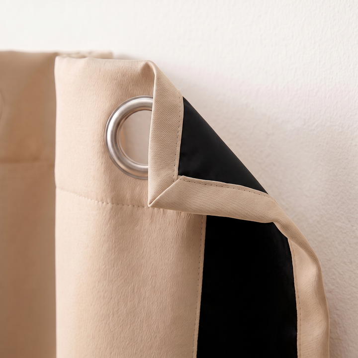Room Darkening Curtain Panel – Grommet Top in Beige – close-up of grommet and folded corner showing black backing