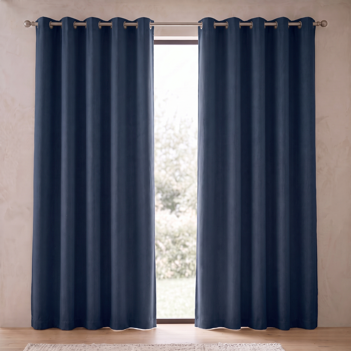 Room Darkening Curtain Panel – Grommet Top in Navy Blue – evenly spaced grommets and soft vertical folds on slim rod