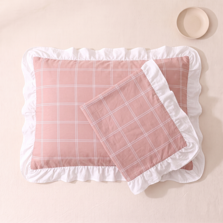 Cotton Pillowcases – Ruffled Plaid, Set of 2 in Rose Pink Grid – case flipped over pillow, round plate at upper right