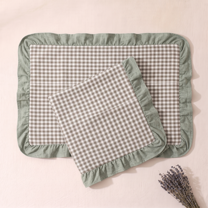 Cotton Pillowcases – Ruffled Plaid, Set of 2 in Sage Gingham – one case tilted over another flat one, dried lavender in lower corner