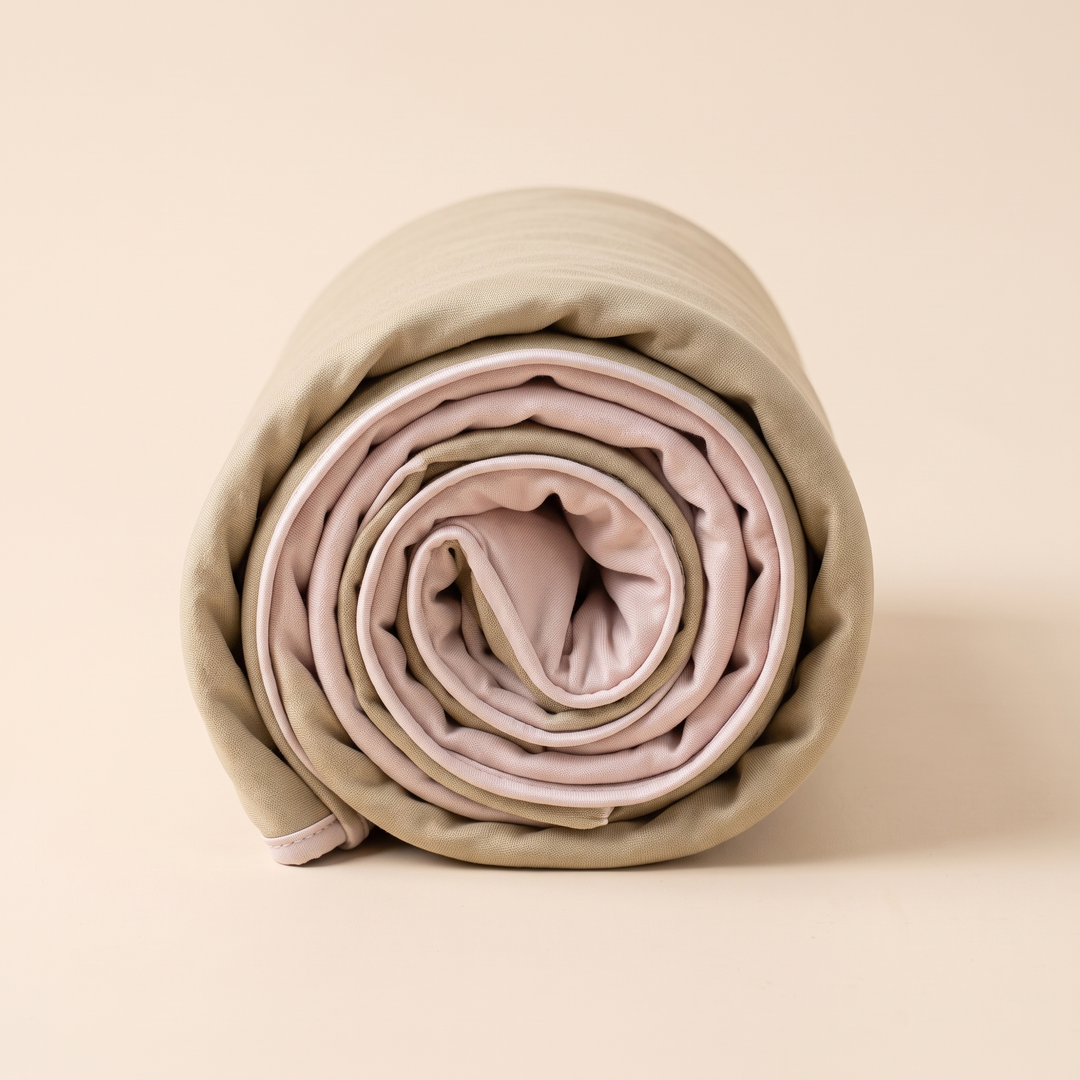 Sand-Free Beach Towel – Quick-Dry in Khaki &amp; Light Pink – end-on view of a loose spiral roll showing the inner layers
