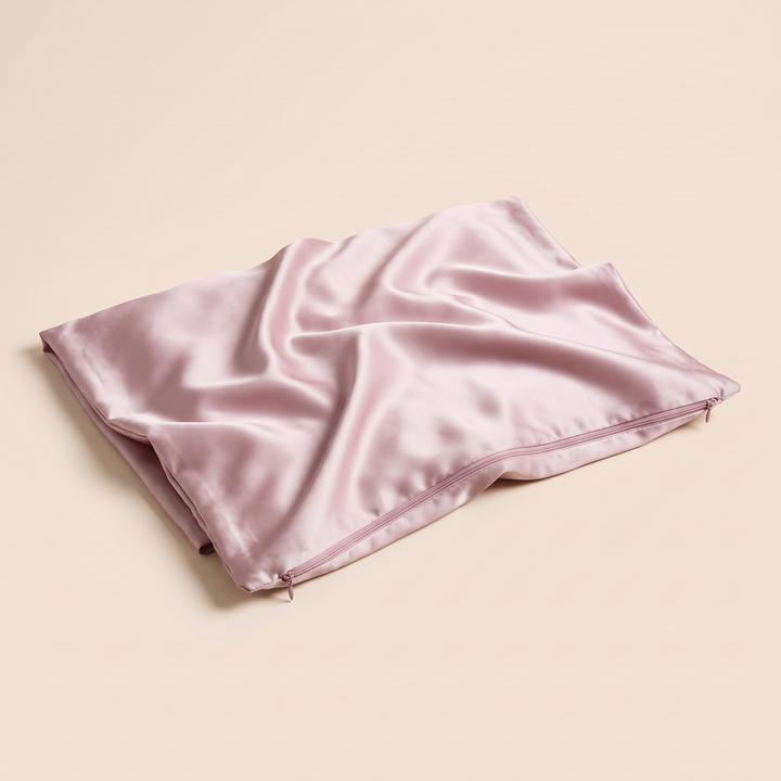 Silk Pillowcase – 19 Momme in Dusty Pink – zipper edge facing front with softly crumpled fabric
