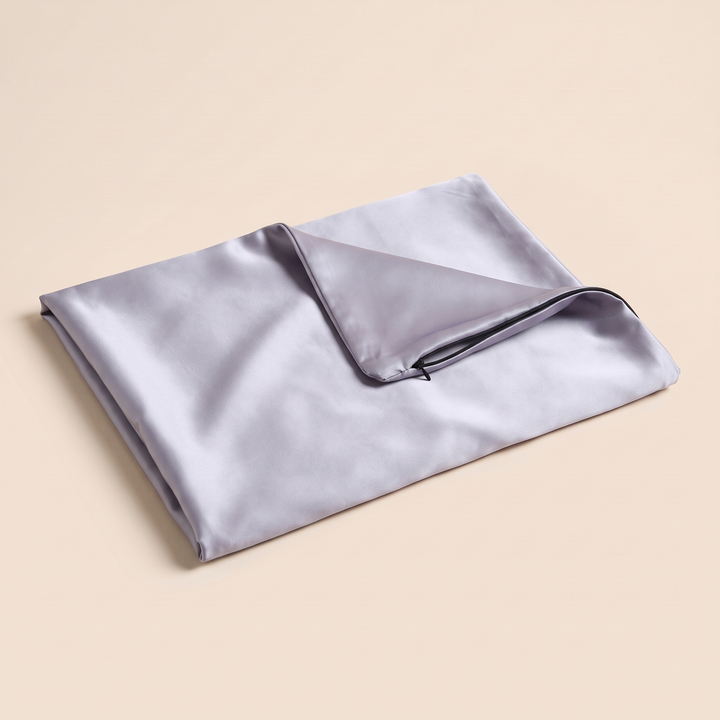 Silk Pillowcase – 19 Momme in Gray – folded with one corner turned back to reveal the inner lining