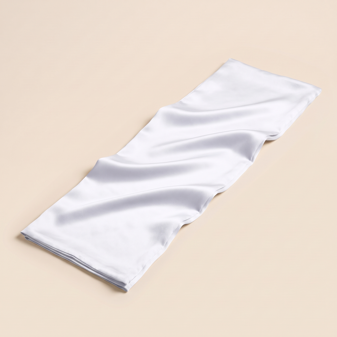 Silk Pillowcase – 19 Momme in White – stretched out diagonally with gentle ripples, seen from a high angle