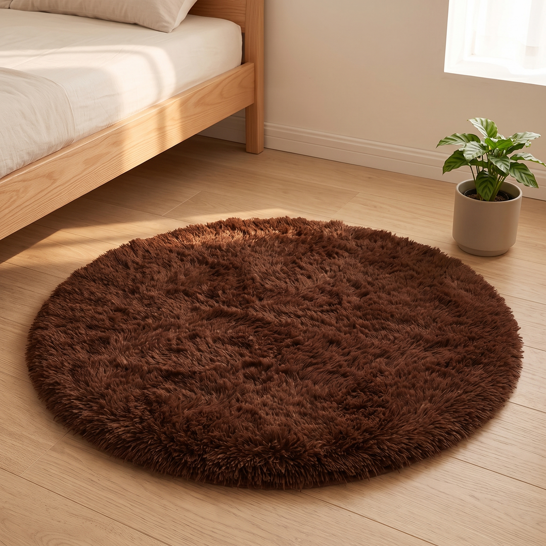 Small Round Shag Rug in Dark Brown – in a sunlit corner beside a potted leafy plant