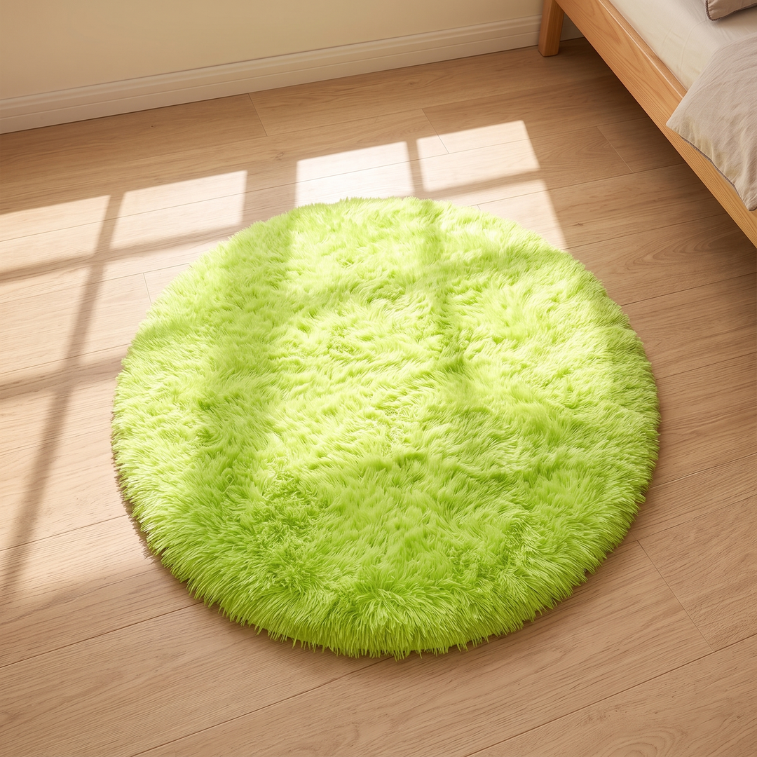 Small Round Shag Rug in Lime Green – with window-frame shadows cast across it in bright sunlight