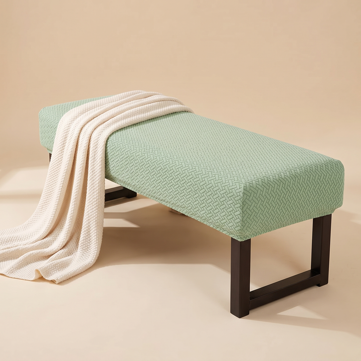 Stretch Bench Seat Cover – Jacquard in Mint Green – with a knit throw blanket draped across the seat