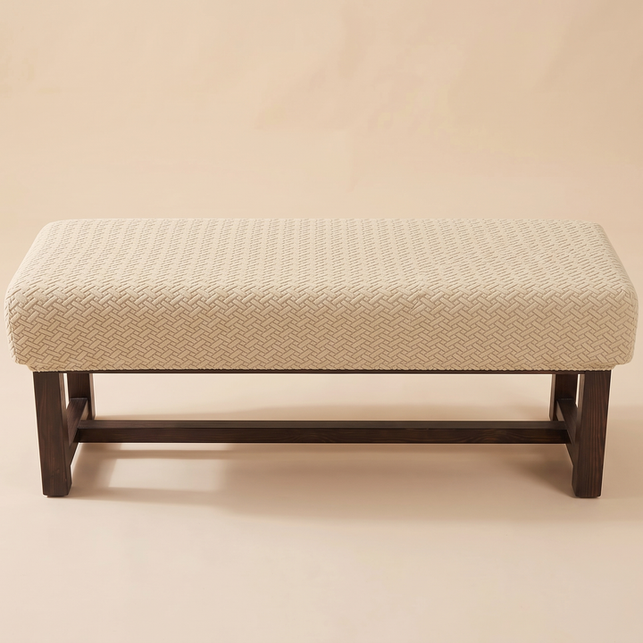 Stretch Bench Seat Cover – Jacquard in Oat – straight-on eye-level view showing the wooden legs and side stretcher