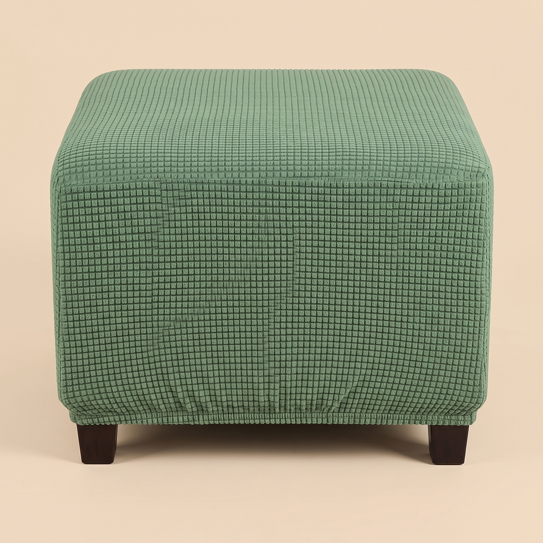 Stretch Ottoman Cover in Forest Green – tight front view showing rounded top edges and legs