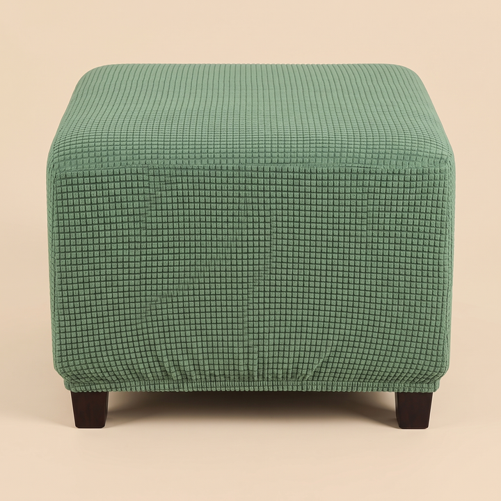 Stretch Ottoman Cover in Forest Green – tight front view showing rounded top edges and legs