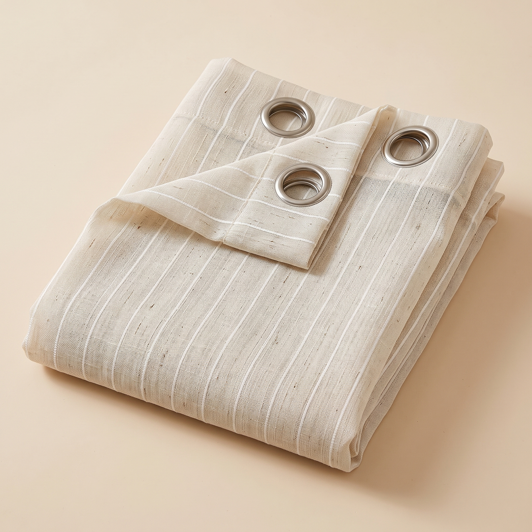 Striped Sheer Curtain Panel – Linen Look in Oat – folded neatly with a corner turned back showing grommets