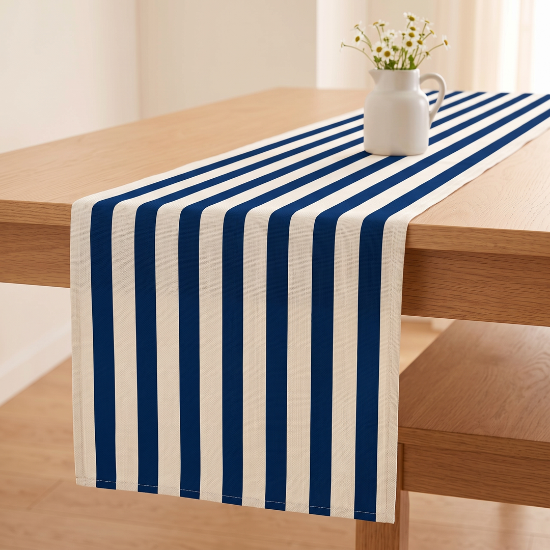 Striped Table Runner in Royal Blue Stripe – with a white pitcher of daisies on top