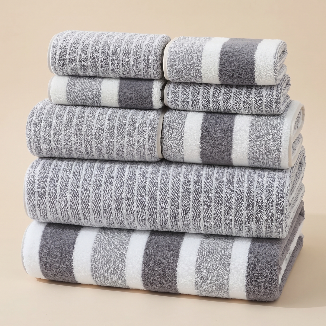 Striped Bath Towel Set – 8 Piece in Gray Stripe – folded and stacked in a pyramid on a beige background