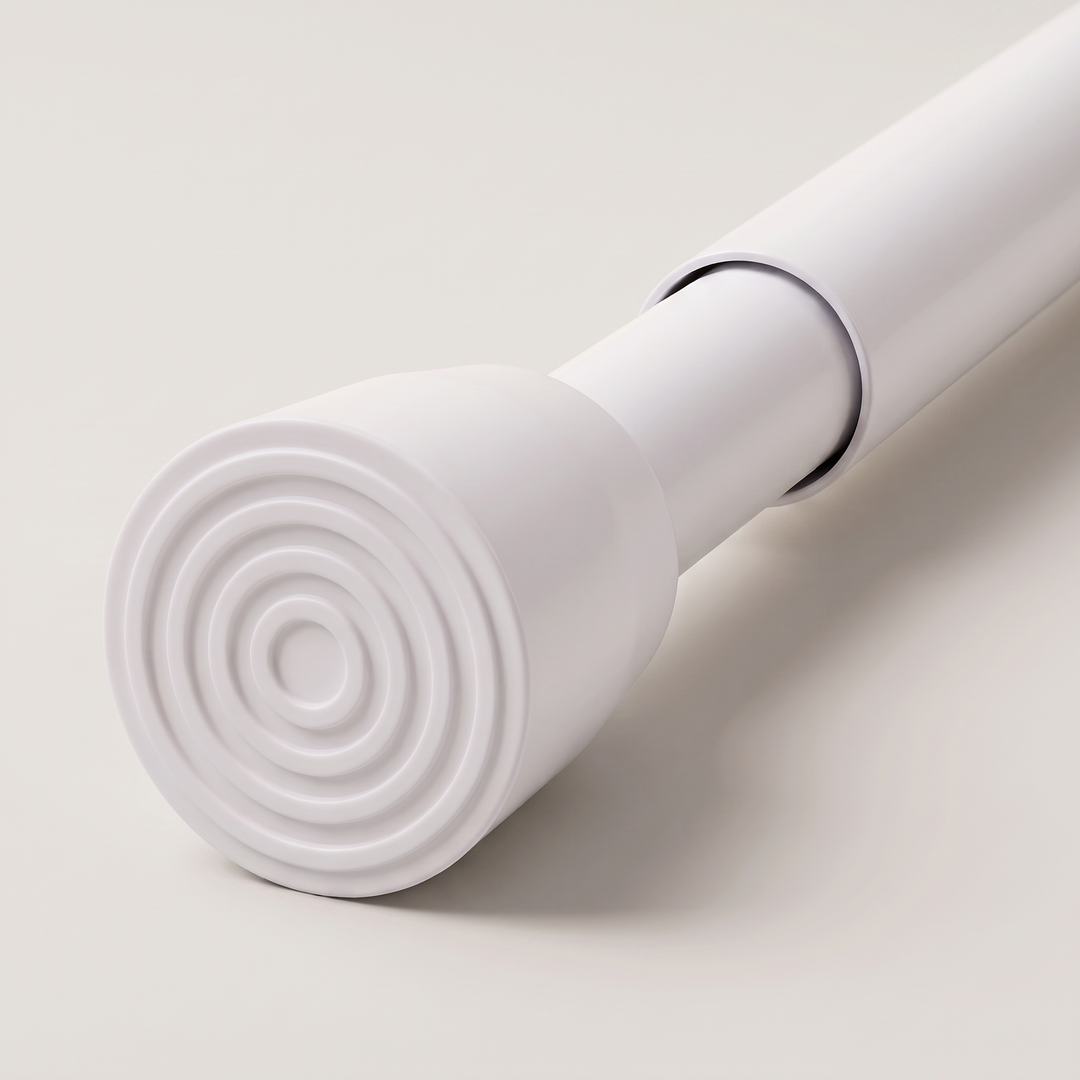 Tension Curtain Rod – No Drill in White – close-up of the ridged rubber end cap and telescoping joint