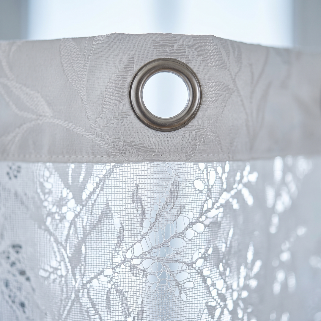 Textured Shower Curtain – Botanical Jacquard in White – close-up of the metal grommet and leaf patterned top hem