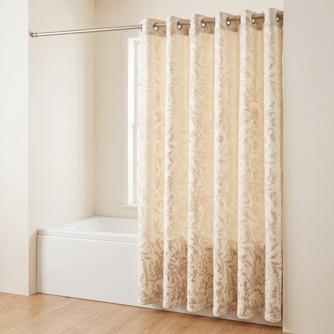 Textured Shower Curtain – Botanical Jacquard in Cream – long drop hanging to the wood floor beside a window