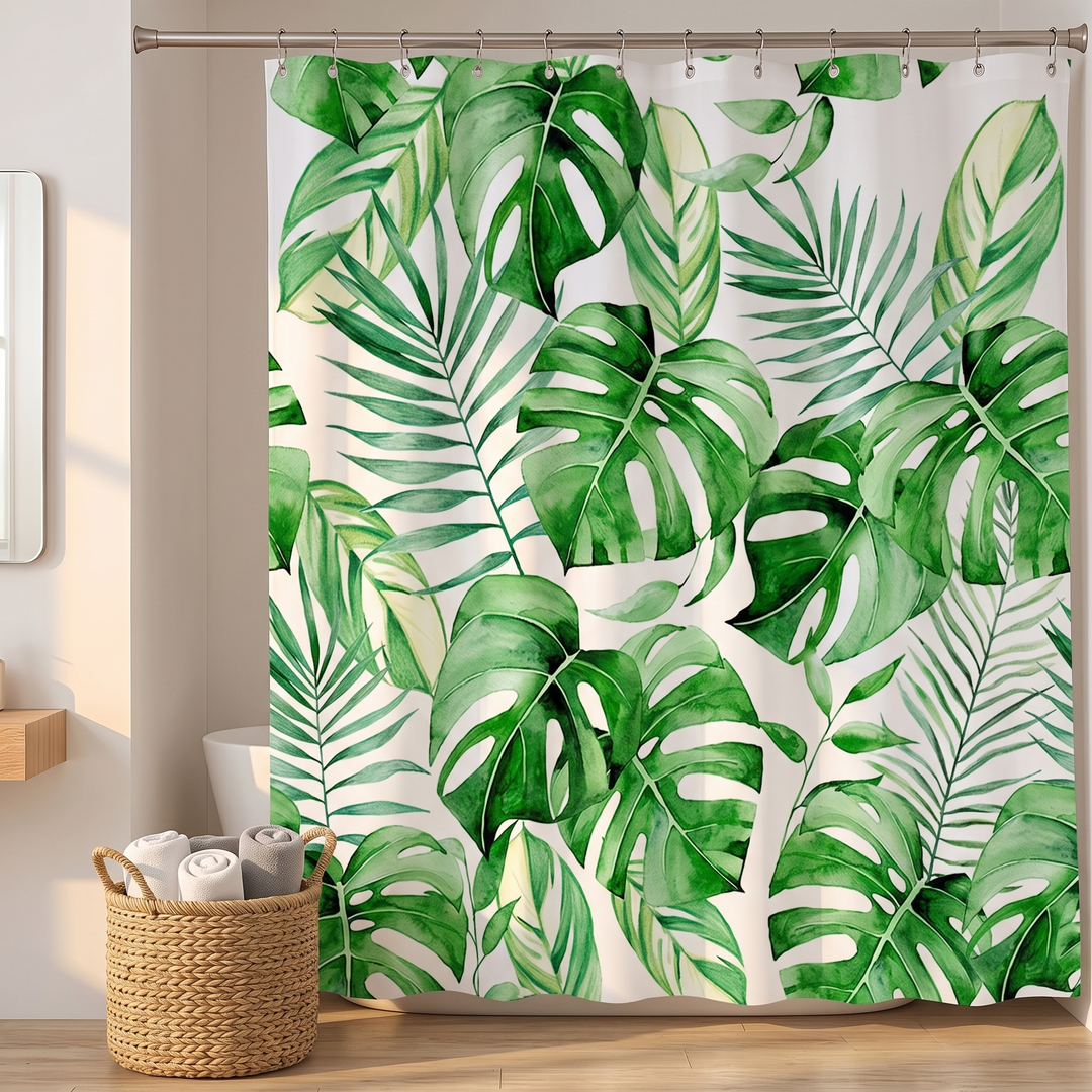 Tropical Shower Curtain – Monstera &amp; Palm Leaves in Green – Monstera – closed on a rod with a woven basket of rolled towels