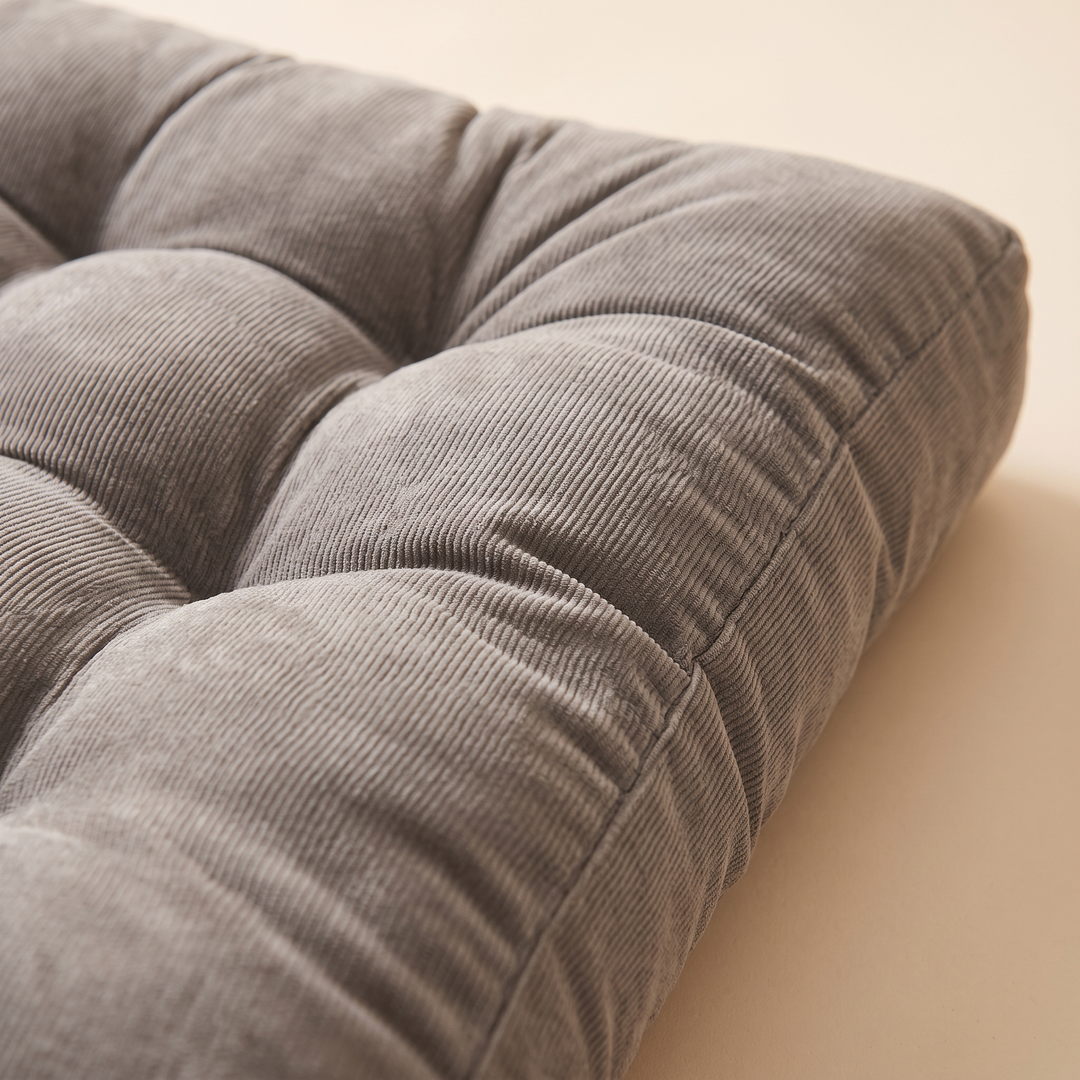 Tufted Floor Cushion – Square in Gray – close-up of corduroy texture and tufted corner stitching
